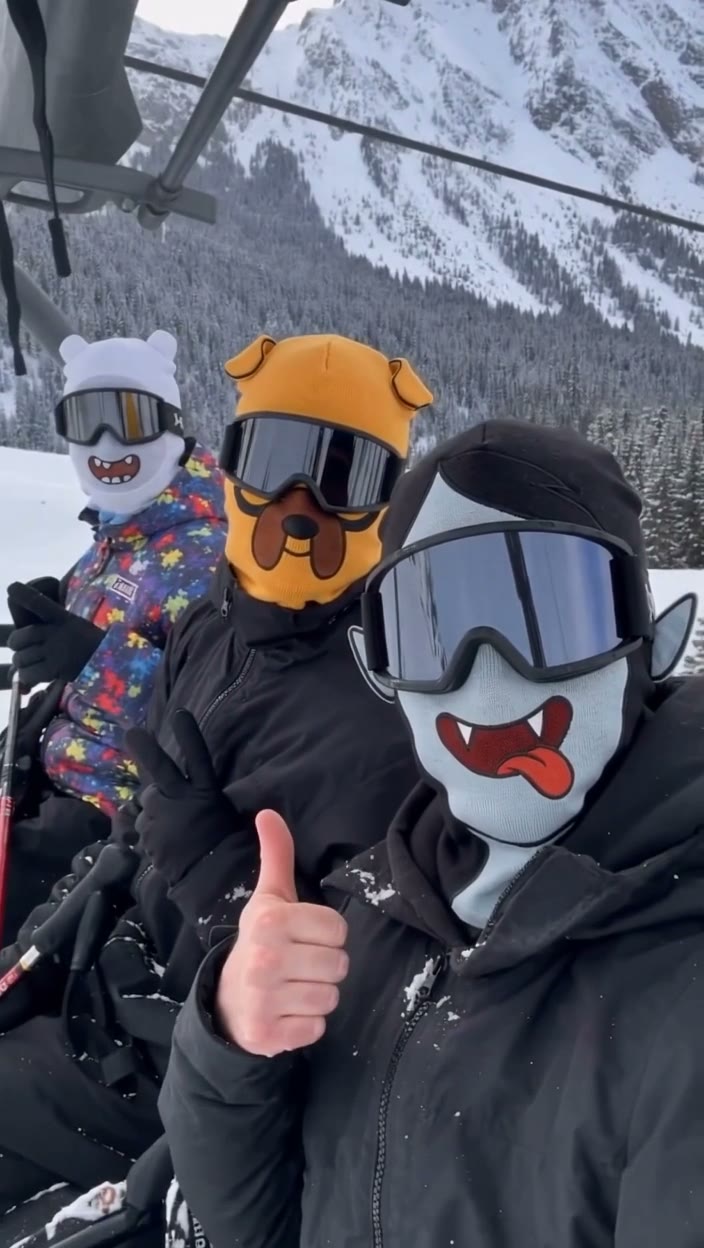 Friends skiing in AdventureMask ski masks